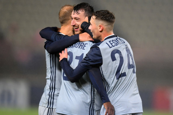 Melbourne Victory players celebrate their first away win in the Asian Champions League.