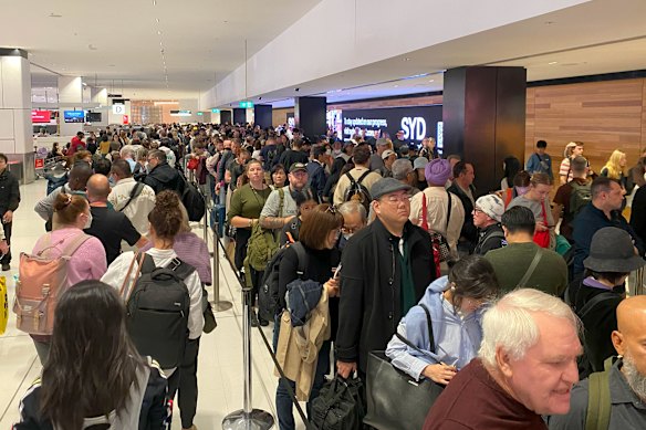 Long queues for immigration and security at Sydney Airport.