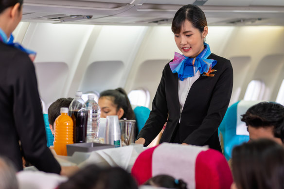 Cabin crew typically serve meals shortly after take-off and before landing.