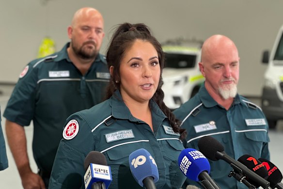 St John Ambulance paramedic Bec Thompson speaks to media on Monday.