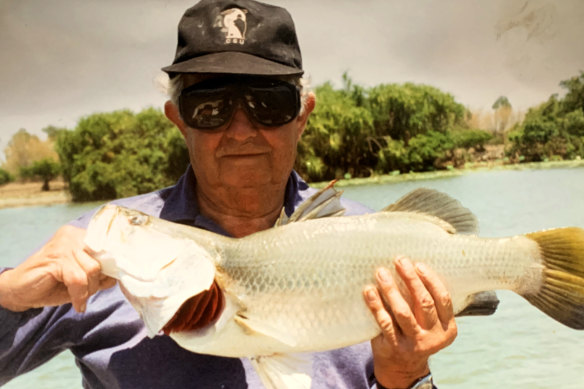 Australian Bureau of Criminal Intelligence chief Fred Silvester (wearing a surveillance branch cap)  with a big fish.
