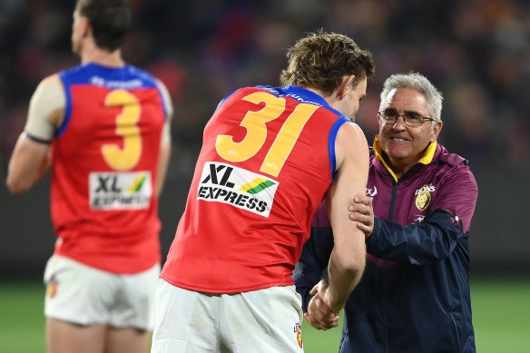 New co-captain Harris Andrews hugs Chris Fagan post game after last season’s semi-final win over Melbourne.