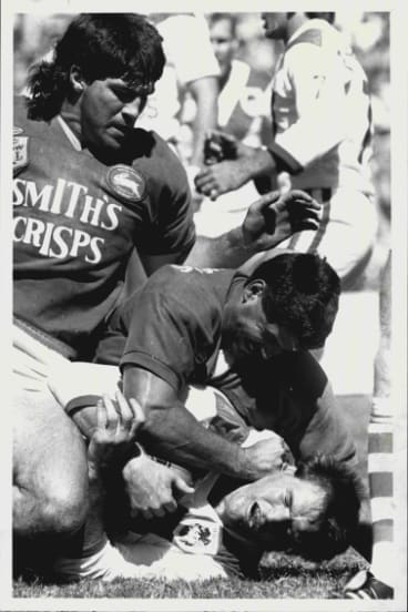 Hardman: St George's Graeme Wynn feels the full impact of tackles by south Sydney's Wayne Chisholm and Les Davidson in 1987. 
