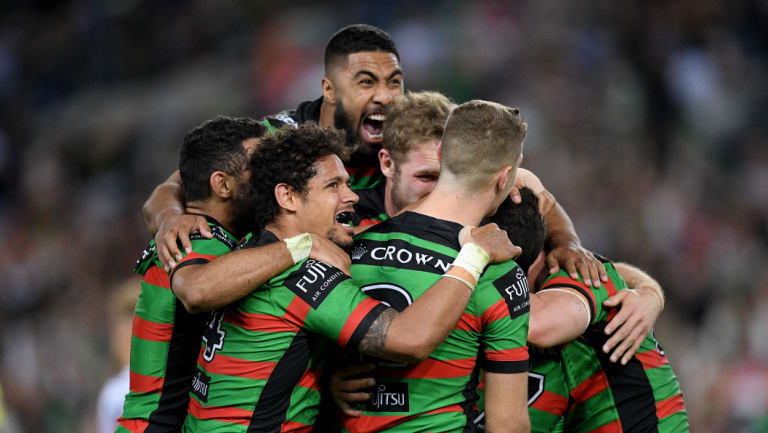 Left leaning: South Sydney Rabbitohs celebrate  a try against the Dragons last week.