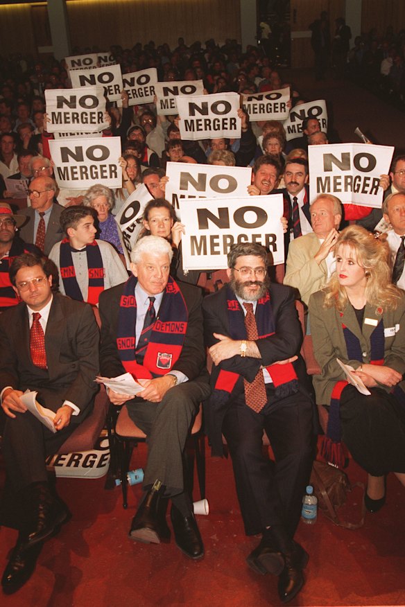 Dixon and Joseph Gutnick among Melbourne supporters at an anti-merger meeting in the 1990s.