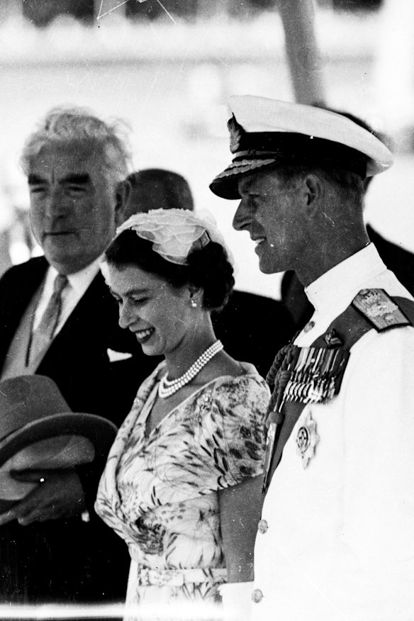 Prime Minister Robert Menzies accompanies Queen Elizabeth II and the Duke of Edinburgh at Sydney Harbour in 1954, the first of sixteen Australian visits she made during her 70 year reign.