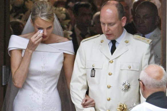 Princess Charlene wipes away a tear after her wedding to Prince Albert in 2011. 