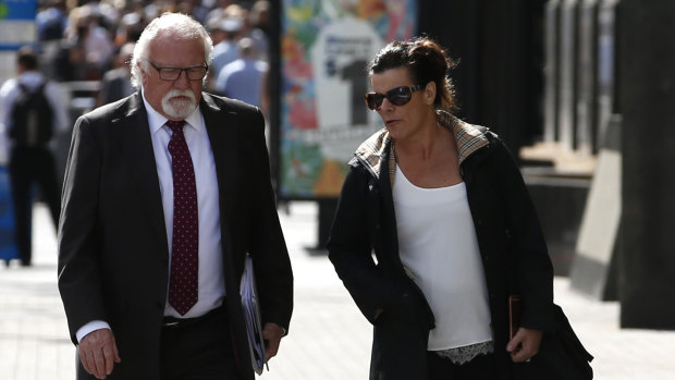 Linda Brooks (right), the wife of Olympian Neil Brooks, arrives with lawyer Chris Hannay at the Brisbane Magistrates Court.