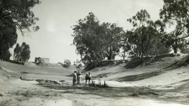 Roy Smith, his wife Nel and their son Barrie are among those standing in the Darling River bed at Balcatherine Station, c.1945. Balcatherine has been in the Smith family for five generations. 