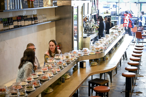 The sushi train, imported from Taiwan, fits the narrow Bourke Street site.