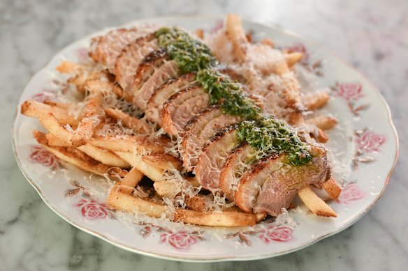 Shoestring fries smothered in gravy and topped with seared, sliced duck breast at Love Letter in Richmond.