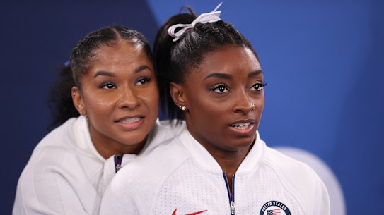 Jordan Chiles and Simone Biles of Team United States react during the women’s team final in Japan on Wednesday.
