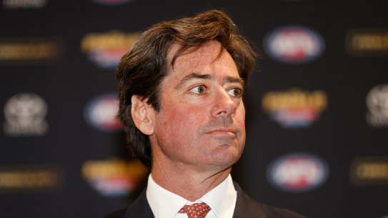 AFL chief Gillon McLachlan says he will remain in charge until after the Hawthorn racism case has “settled down”.