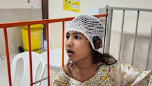 A child wounded, according to Tasnim news agency, in a strike on a home where a wedding was being held in Kuhestak, southern Iran, receives treatment at a hospital in Menab, Iran, early Wednesday, Sept.2, 2026.