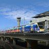 The cost of a one-way trip between Central and the airport will drop from $21.90 to $10.95 during the six-month trial.