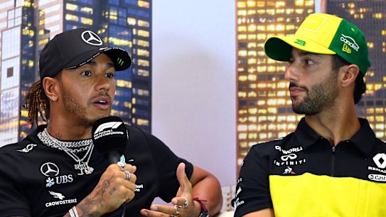 Lewis Hamilton, left, and Daniel Ricciardo, right, at a press conference in Melbourne.