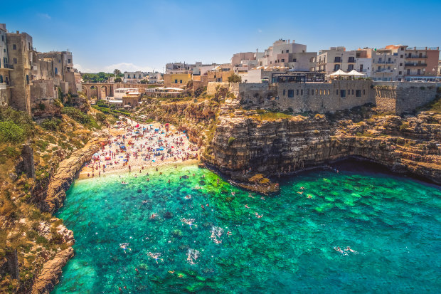 Polignano a Mare is renowned in Italy for Lama Monachile Cala Porto, a heart-shaped slither of sand formed between the sides of dual cliff faces.