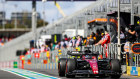 Netflix star Valterri Bottas races under the Kick logo at the Melbourne Grand Prix in 2023.