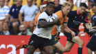 Fiji’s Josua Tuisova on the way to scoring for Fiji in their win over Australia at the Stade Geoffroy Guichard in Saint-Etienne.