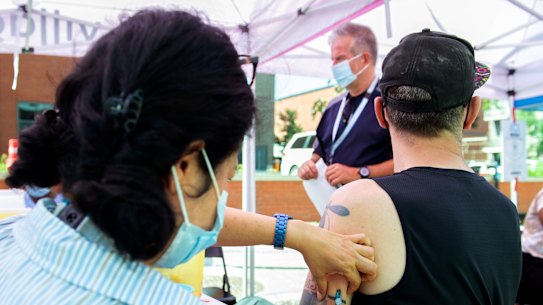 A man receives a monkeypox vaccine in Canada.