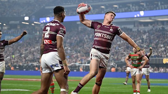 Reuben Garrick spikes the ball after a try.