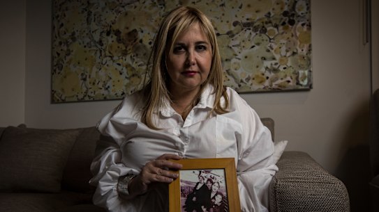 Judith Aronovitch holds a picture of her mother Luba.