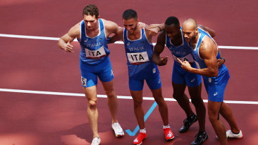 Filippo Tortu, Lorenzo Patta, Eseosa Fostine Desalu and Lamont Marcell Jacobs of Team Italy pose together after the semi-final. 