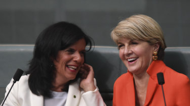 Former Australian foreign minister Julie Bishop (right) speaks to Liberal backbencher Julia Banks.
