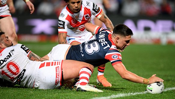 Lock Victor Radley scores one of the Roosters' six tries.