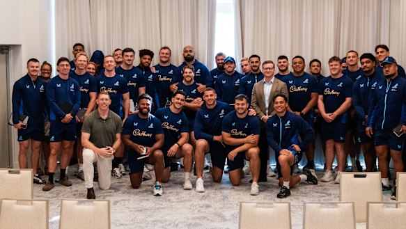 RUPA boss Adrian Turner (middle) with the Wallabies in camp recently.