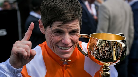 Jubilant jockey Craig Williams celebrates his first Melbourne Cup win.