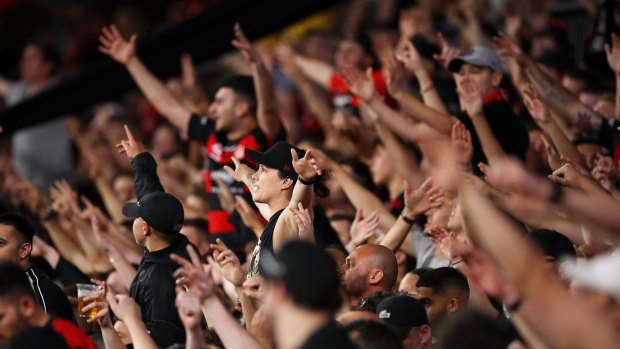 Wanderers supporters in full cry for the first derby at their new home.