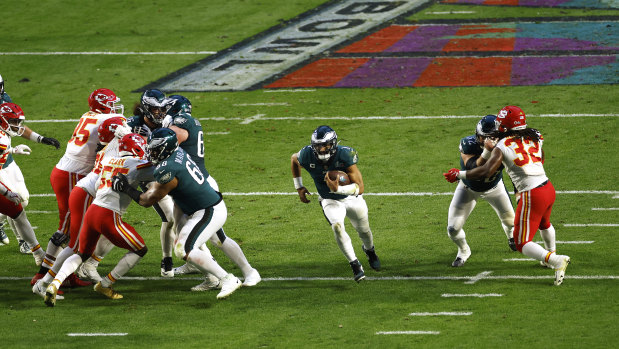 Eagles quarterback Jalen Hurts runs in his second touchdown of the game.