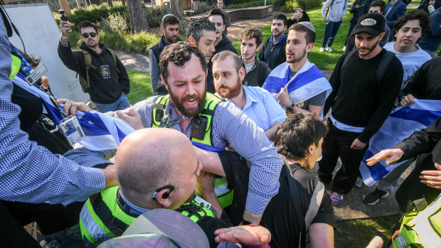 At the pro-Palestinian encampment at Monash University on Wednesday, a clash developed with security when pro-Israel supporters attempted to storm the stage where speeches were being conducted.