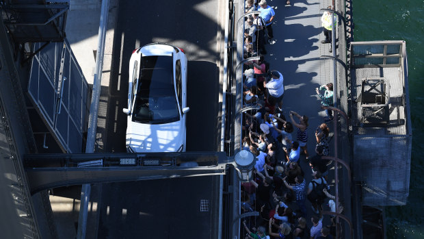 A crowd gathered to see the Duke of Sussex climb the Sydney Harbour Bridge.