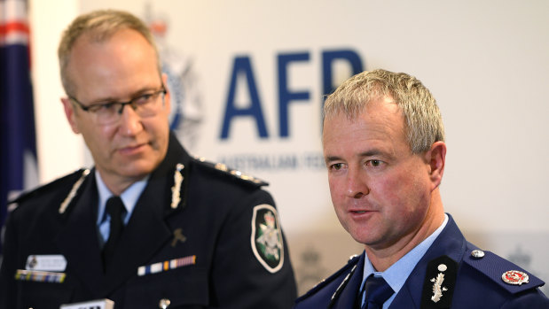 AFP Assistant Commissioner Ian McCartney and NSW Police Assistant Commissioner Michael Willing address media in Sydney on Tuesday.