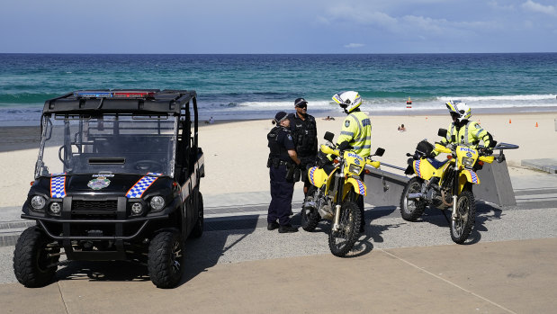 Police at Surfers Paradise Beach on the Gold Coast, Thursday, April 2, 2020. 