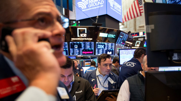 Traders at the New York Stock Exchange: US stocks took a breather on Friday.