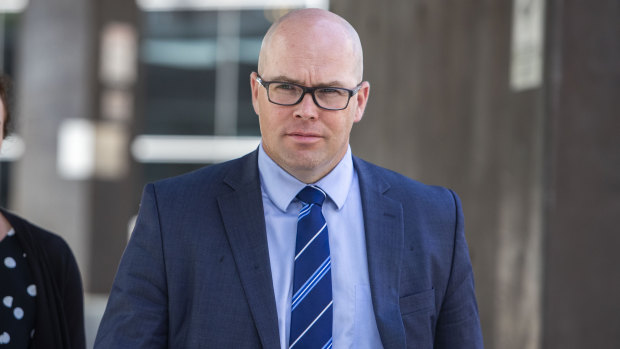 Detective Sergeant William Freeman is seen leaving the Brisbane Coroners Court on Monday.