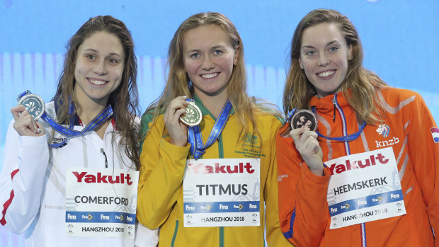 Precious medals: Gold medalist Australia's Ariarne Titmus stands between Silver medalist Mallory Comerford and Bronze medalist's Femke Heemskerk.