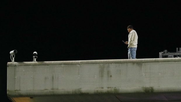 A man climbed onto the top of a stand at the SCG on Saturday night during the Australia and England rugby Test.