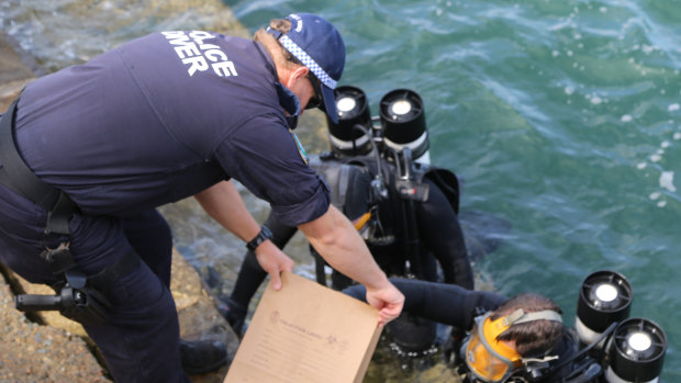 Police divers found items of interest at the bottom of Sydney Harbour on Wednesday. 