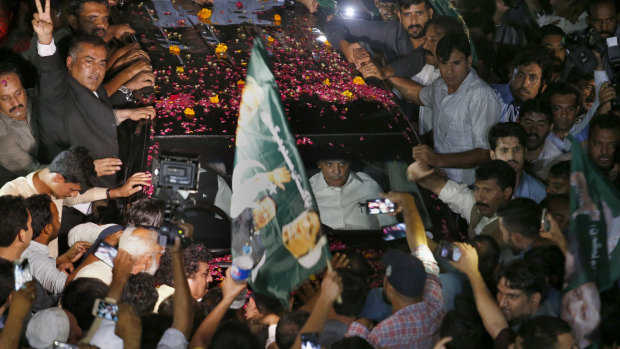 Supporters showered former Pakistani prime minister Nawaz Sharif's car with rose petals after his release from prison. 