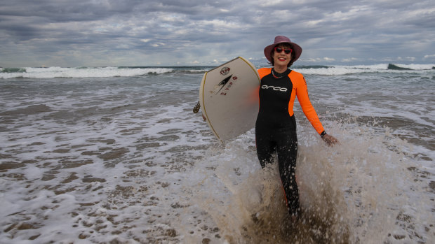 Back to her old stomping ground: Author Kathy Lette at Cronulla’s Elouera beach.