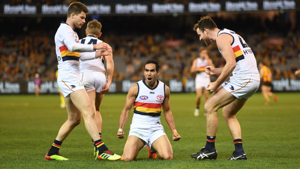 Eddie Betts kicks a goal for the Crows.