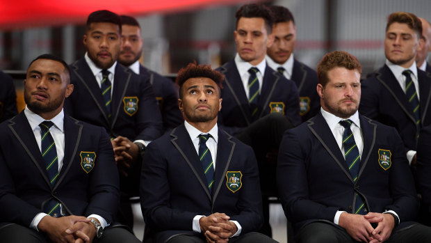 Senior figure: Sekope Kepu, left, with Will Genia and James Slipper in the front row of the Wallabies squad during the World Cup announcement.