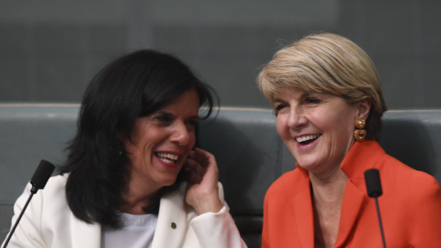 Former Australian foreign minister Julie Bishop (right) speaks to Liberal backbencher Julia Banks.