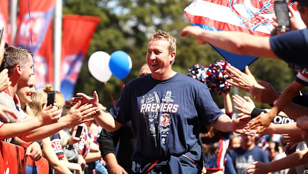 Trent Robinson celebrates the 2018 title with his Sydney Roosters fans.