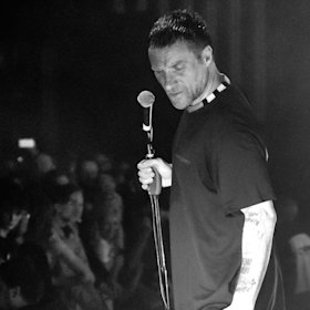 Jason Williamson on stage at London’s Hammersmith Apollo in 2019.