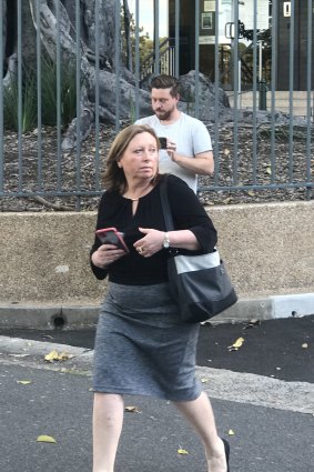 Rebecca Cartwright leaves Parliament House after collecting a hard drive for ICAC.